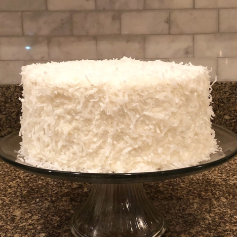 coconut layer cake Swiss meringue buttercream shredded coconut by Chef Lynn Wheeler