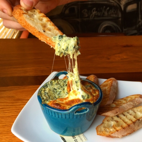 kale and artichoke dip with grilled toast by Chef Lynn Wheeler