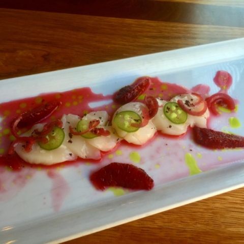 raw scallop blood orange pickled red onion chive oil jalapeño by Chef Lynn Wheeler