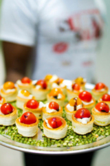 caprese salad bites cherry tomato basil leaf mozzarella reduced balsamic puff pastry shell by Chef Lynn Wheeler