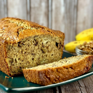 Homemade sourdough discard banana bread loaf with sliced pieces